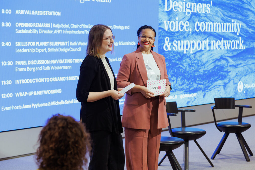 Hosts Anna Pyyluoma and Michelle Sahal Estimé addressing the audience at Sustainable Design Talks, symbolising collaboration and shared momentum toward sustainable futures.